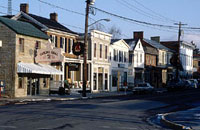 storefronts and residences on a Berryville street