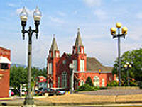 red brick church and street lamps in Clifton Forge