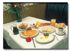 table full of food at a diner